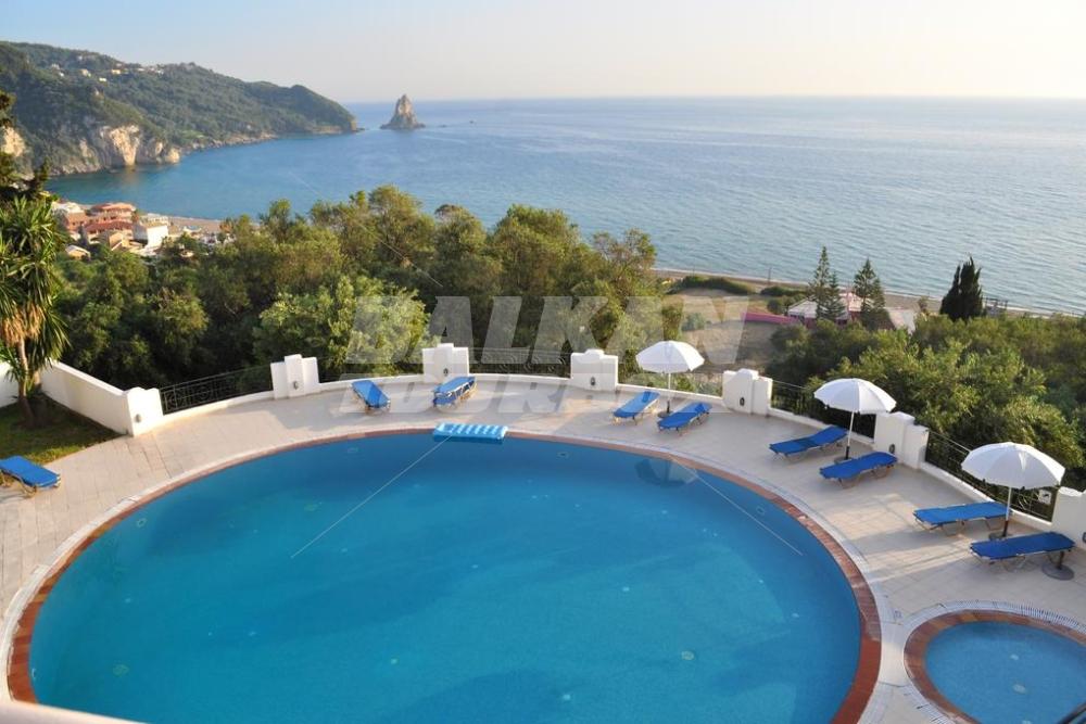 holiday in Studio apartments Maria with pool in Agios Gordios Beach