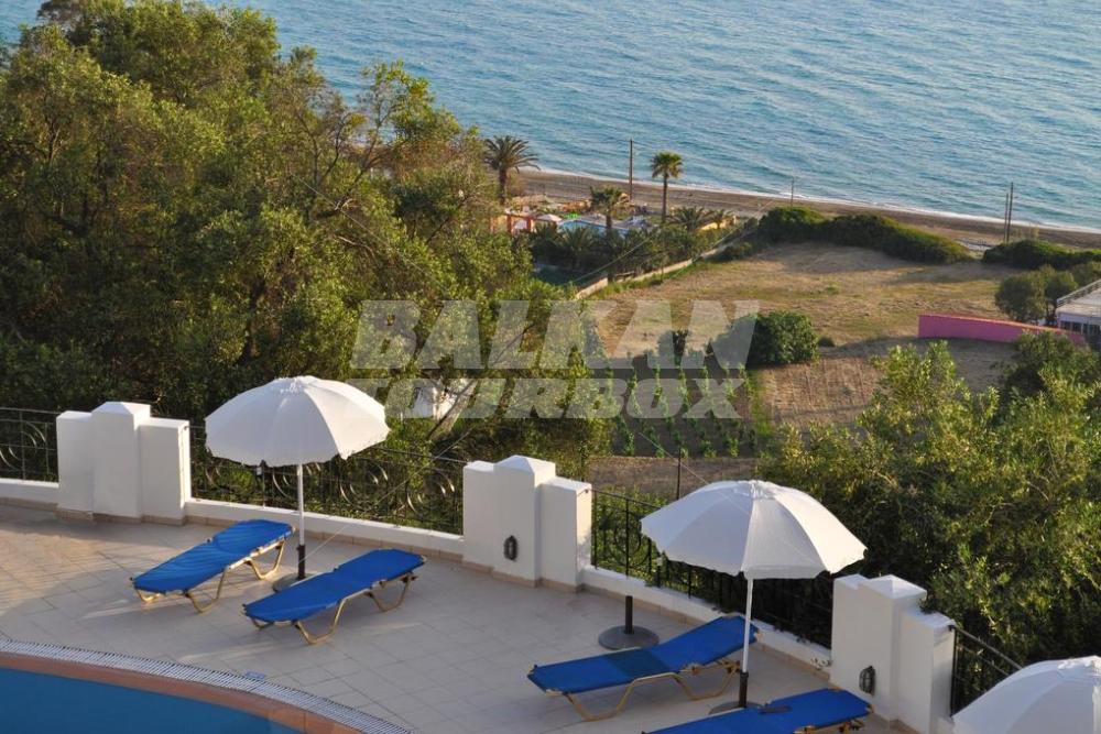 holiday in Studio apartments Maria with pool in Agios Gordios Beach